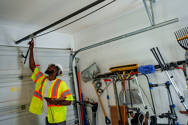 Professional Garage Door Roller Replacement technician working in Michigan Center, MI
